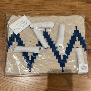 Mudpie chevron tassel clutch.